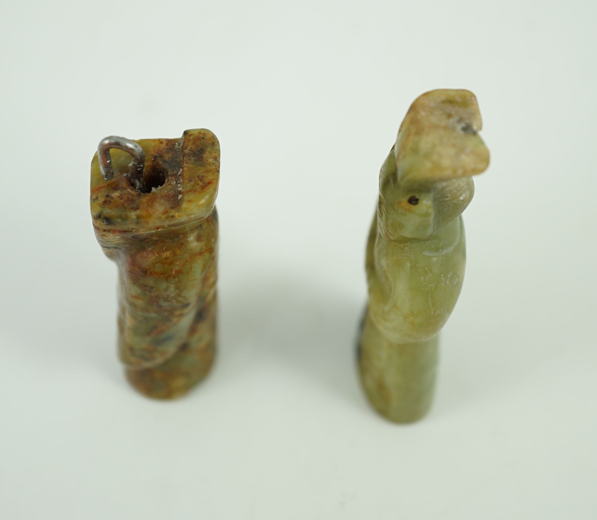 Two Chinese archaic jade figures of a man, probably Western Zhou to Han dynasty